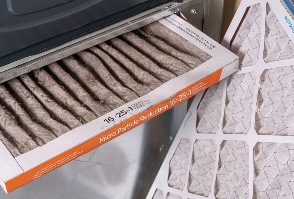 Replacing a dirty air conditioner filter to remove bad smells and improve indoor air quality — common solution for smelly AC issues by Arctic Air, offering AC repair, filter replacement, and HVAC maintenance services. Call us now for help with how do I get rid of the smell in my air conditioner, AC smells musty, air conditioner smells bad when turned on, air conditioner smells like mildew, air conditioner odor removal, why does my AC smell, smelly air vents in house, eliminate mold smell from AC, bad smell from AC unit, HVAC smell troubleshooting, fix AC odor, AC coil cleaning, clean air conditioner drain line, replace air filter AC, air conditioner cleaning services, HVAC maintenance near me, AC repair near me, smelly air conditioning fix near me, air conditioner tune-up, AC maintenance services near me, dirty AC filter smell, HVAC odor removal services, Arctic Air AC services, AC repair in Palmdale, Lancaster AC cleaning, Tehachapi HVAC maintenance, Rosamond air conditioner repair, Mojave AC service, Littlerock AC tune-up.
