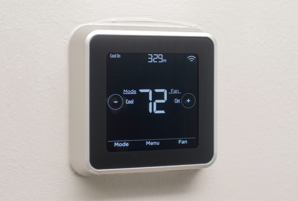 Smart thermostat set to 72 degrees cooling mode on a white wall, representing ideal AC temperature settings for summer comfort and energy savings; related to what temperature to set air conditioner in summer, energy-efficient cooling tips, AC installation, and thermostat services by Arctic Air in Lancaster, Palmdale, and nearby areas. Contact us today for help with what temperature to set air conditioner in summer, ideal AC temperature for summer, best thermostat setting for summer, energy efficient AC settings, recommended AC temperature in hot weather, what temp to set AC when away, summer thermostat settings for comfort, optimal air conditioner setting in summer, best AC setting to save money, how to set AC in summer, energy-saving air conditioner settings, AC not cooling enough in summer, cooling tips for hot weather, air conditioning repair near me, thermostat installation near me, smart thermostat services, AC maintenance services near me, HVAC energy efficiency tips, cooling system tune-up, AC troubleshooting near me, air conditioner running but not cooling, residential AC service near me, best home AC settings, professional HVAC advice for summer, Arctic Air thermostat services, Arctic Air AC maintenance, HVAC services in Lancaster, HVAC services in Palmdale, AC repair in Quartz Hill, HVAC contractor in Rosamond, cooling system services in Mojave, thermostat upgrades in Tehachapi, air conditioning company in Littlerock, AC tune-up near Pearblossom.