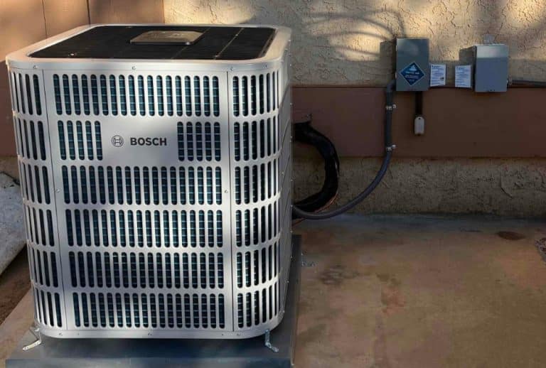 HVAC technician from Arctic Air diagnosing an air conditioner not cooling properly, checking for common AC problems like low refrigerant, dirty filters, or faulty capacitors, related to how to tell what's wrong with your AC, air conditioner repair, and HVAC service. Call today for help with how to diagnose AC problems, why is my air conditioner not cooling, AC not blowing cold air, HVAC troubleshooting guide, air conditioner problems and solutions, AC repair near me, HVAC technician near me, emergency AC repair, central air not cooling, air conditioning inspection, broken AC symptoms, home AC diagnosis, signs your AC needs repair, air conditioner not turning on, common HVAC issues, AC maintenance near me, air conditioning repair services, how to tell if AC is broken, HVAC repair tips, air conditioner repair cost estimate, residential HVAC repair, AC unit not working properly, Arctic Air AC troubleshooting, AC system checkup, air conditioning service near me.
