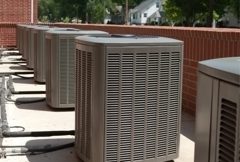 Outdoor air conditioner units with fan and compressor components — related to common AC problems like short cycling, faulty thermostats, refrigerant issues, and HVAC repair services offered by Arctic Air. We provide help with ac short cycling, what causes ac to short cycle, why does my air conditioner turn on and off frequently, ac keeps turning on and off every few minutes, common causes of short cycling in ac units, how to fix ac short cycling, hvac short cycling issues, ac compressor short cycling, air conditioner short cycling repair, ac not staying on, hvac troubleshooting short cycling, air conditioner repair near me, ac repair services near me, local hvac technician near me, short cycling hvac solutions, emergency ac repair near me, ac maintenance services, air conditioning system diagnostics, ac capacitor problems, faulty thermostat short cycling, oversized air conditioner problems, refrigerant issues causing short cycling.