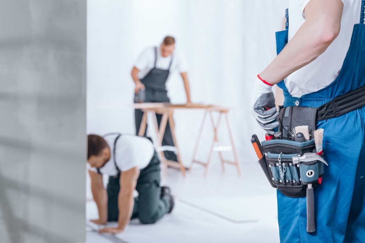 Two workers in a construction setting