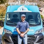 Air Conditioning, Heating & Plumbing Services in Lancaster, CA 4 Arctic Air technician standing in front of his work van